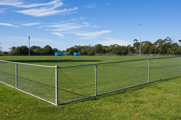 Chainlink Fence-483135005 Chain link fence around sports field